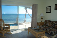 Superb views of the Caribbean from the living room and dining area of a beachfront condo  (TNI Photo)